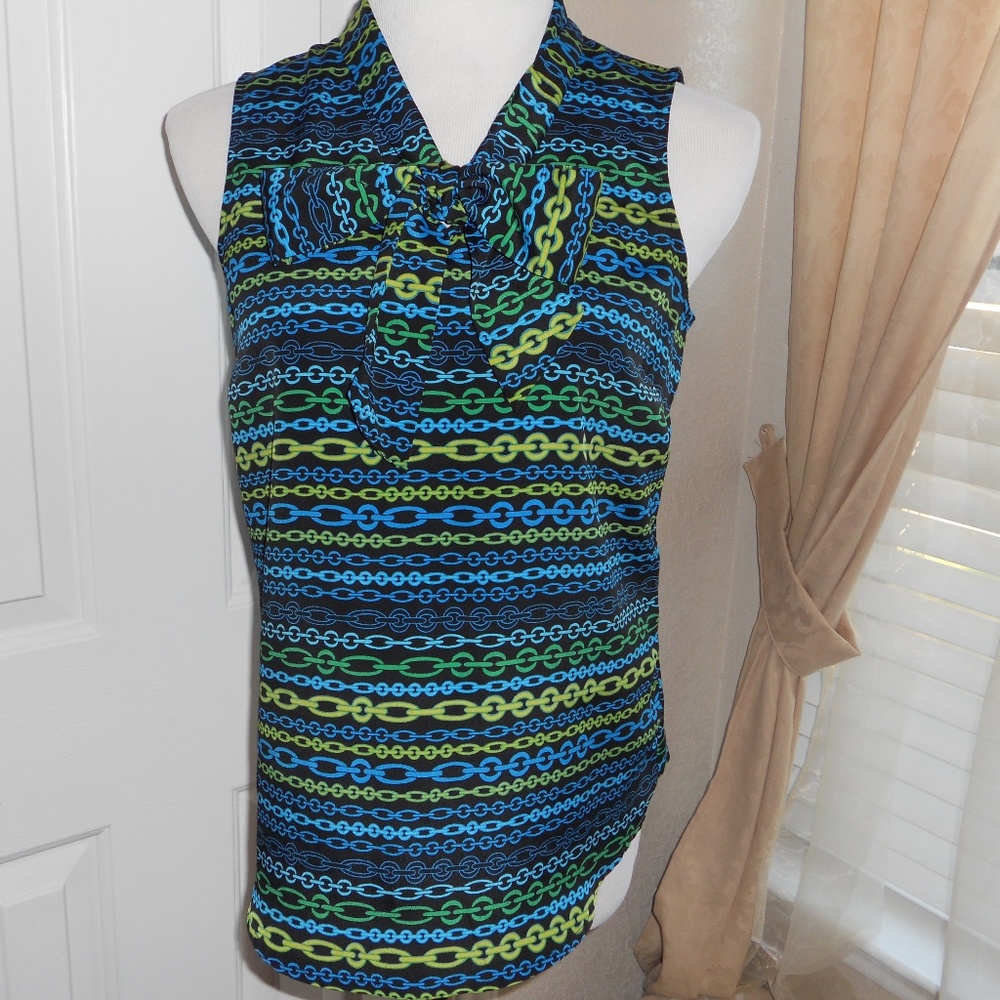 sleeveless blouse with attached bow tie